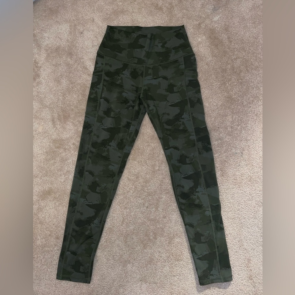 I am selling green camouflage leggings with pockets. They are a women’s medium.